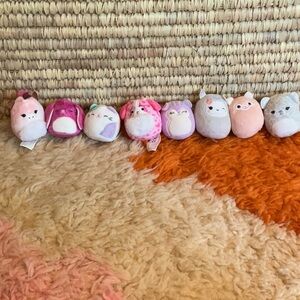 A pack of 8 Squishville animals with different colors and prints